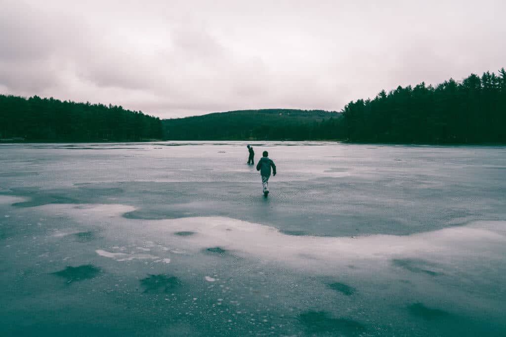 Children running on a Frozen Lake