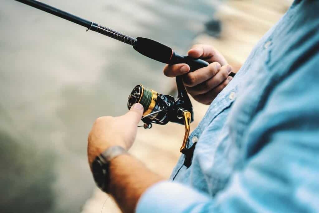 Man using best ultralight spinning reel to fish