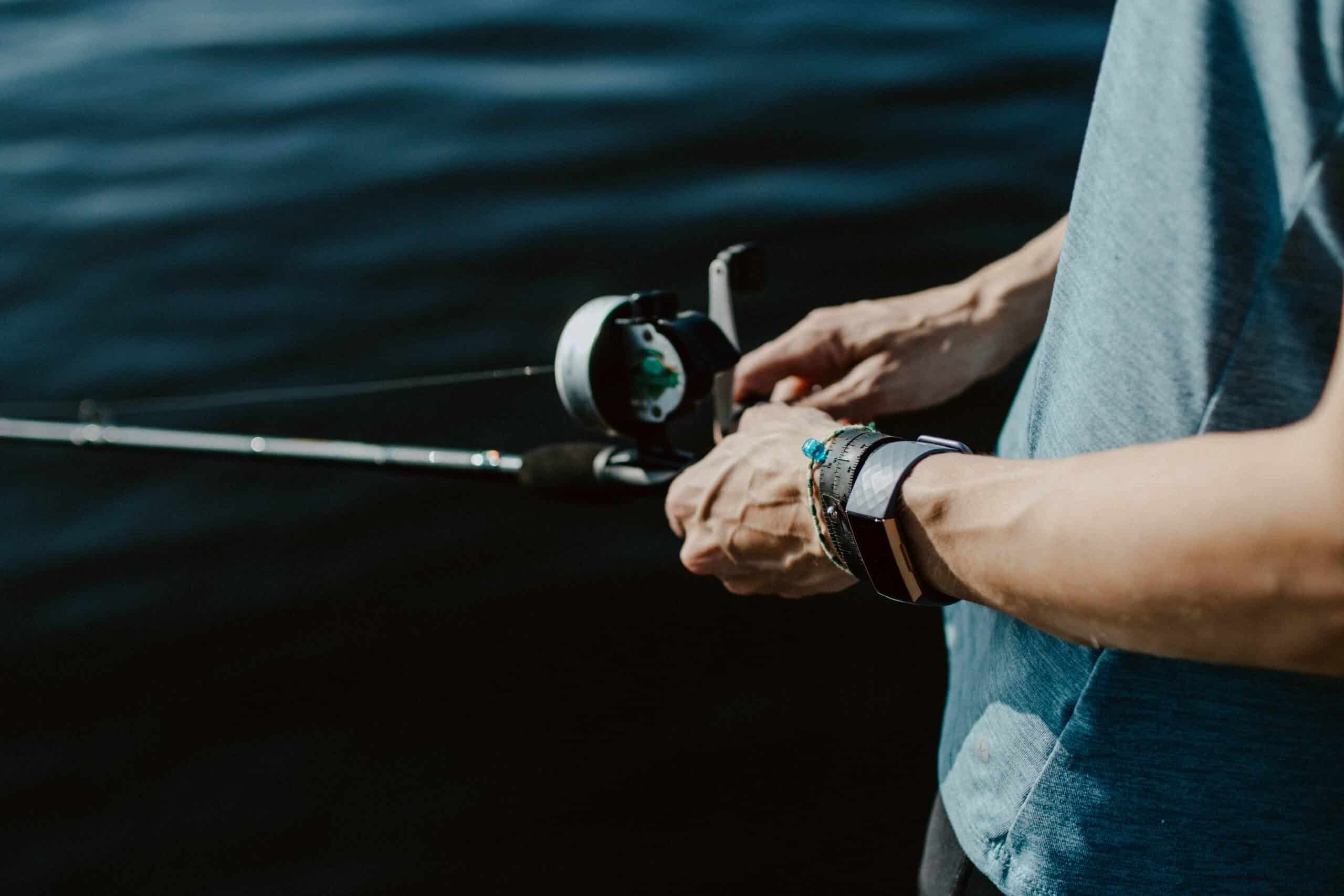 man using one of the best baitcasting reels for beginners