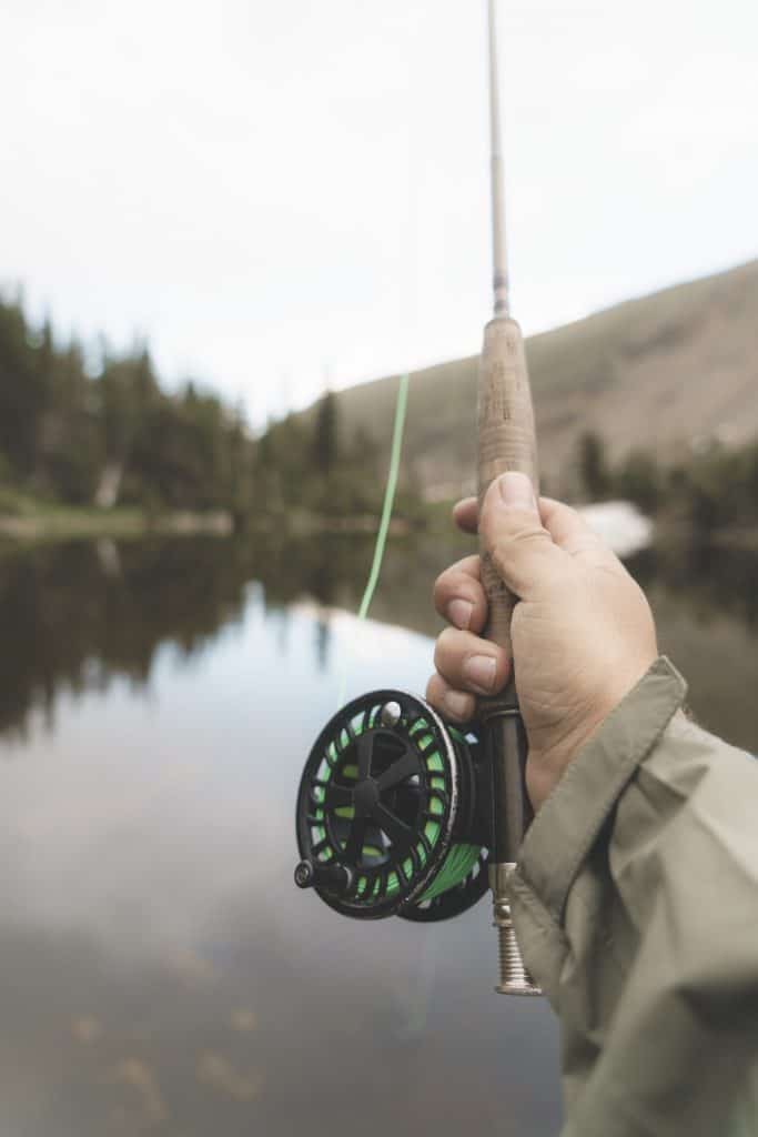 Man holding one of the best bamboo fly rods