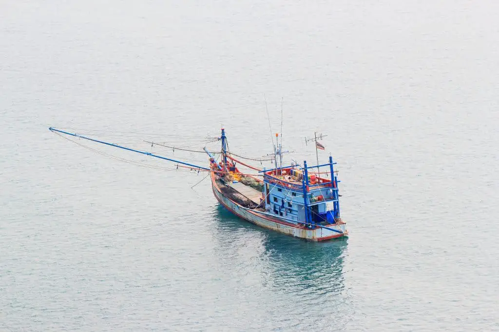 Thai fishing boat used as a vehicle for finding fish in the sea