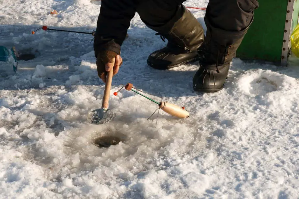 ice fishing in maine on frozen river