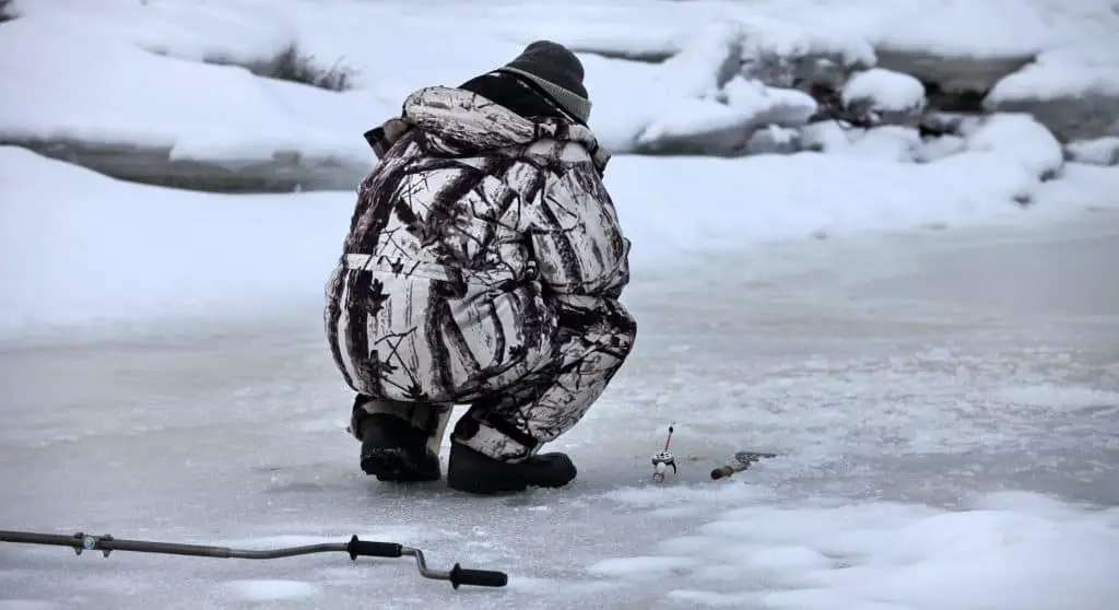 winter fishing rod on red lake